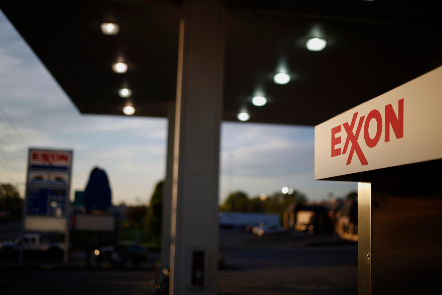 Exxon Mobil’s signage is displayed on a fuel pump at a gas station in Richmond, Kentucky.