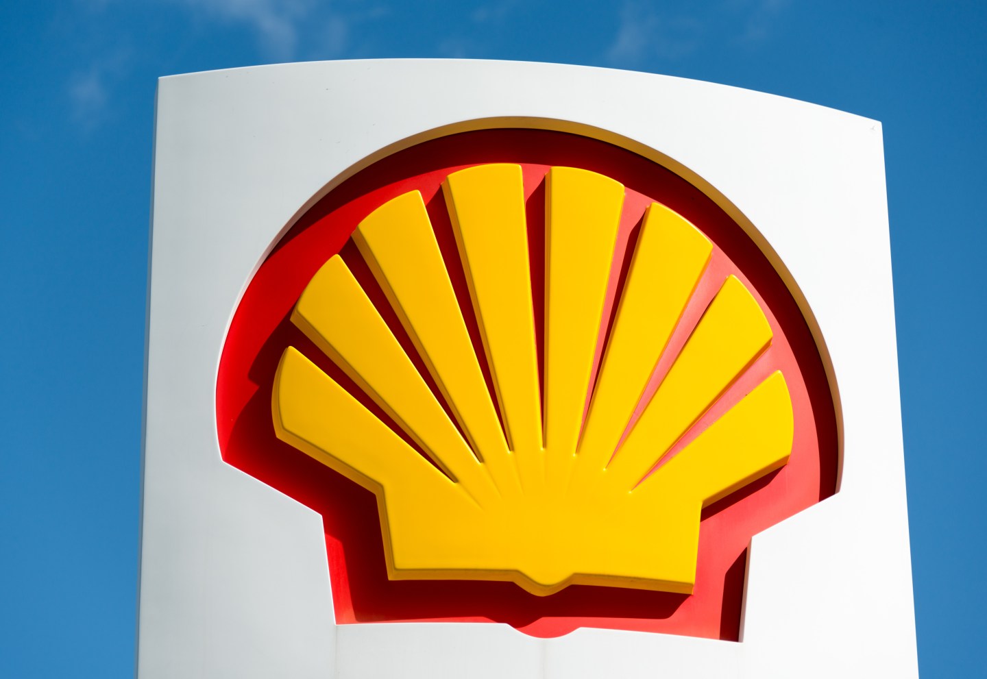 Icon of company Shell over blue sky: Shell Oil Company is