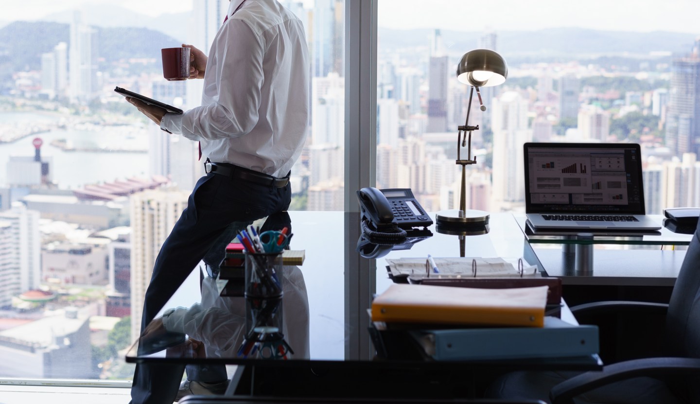 Business Man Reading News Press Review On Tablet PC