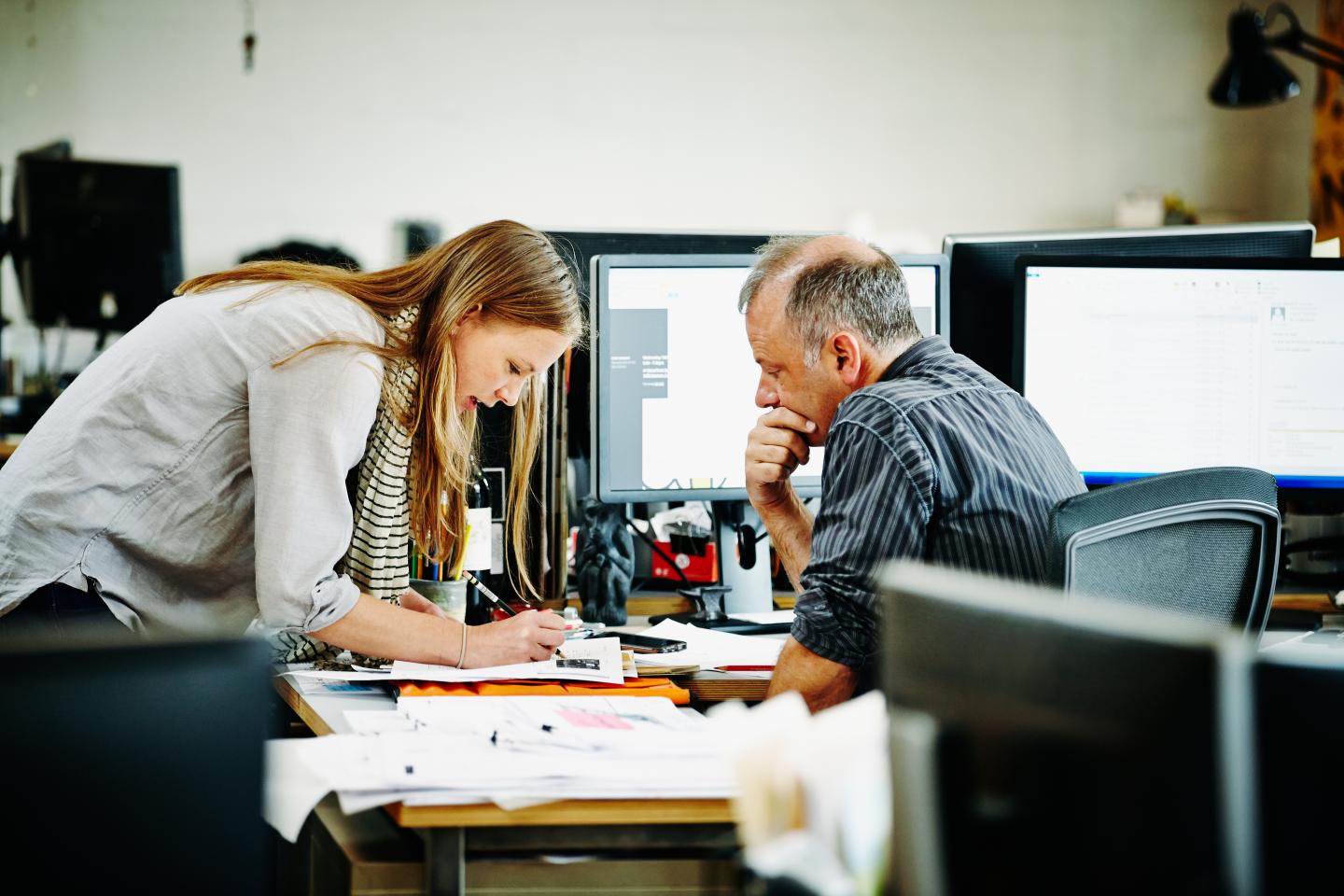 Architect discussing project with coworker