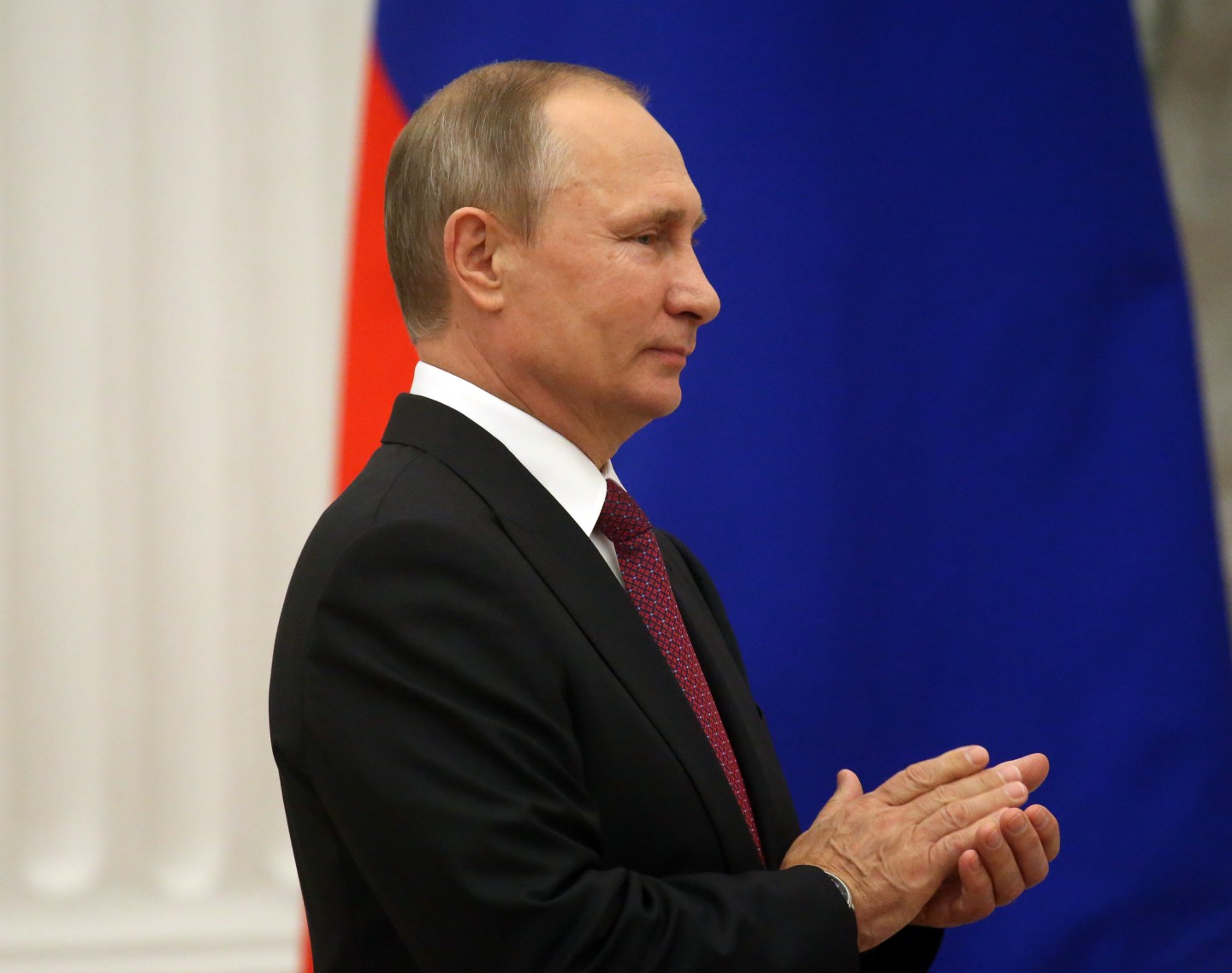 Russian President Vladimir Putin attends the awarding ceremony at the Kremlin