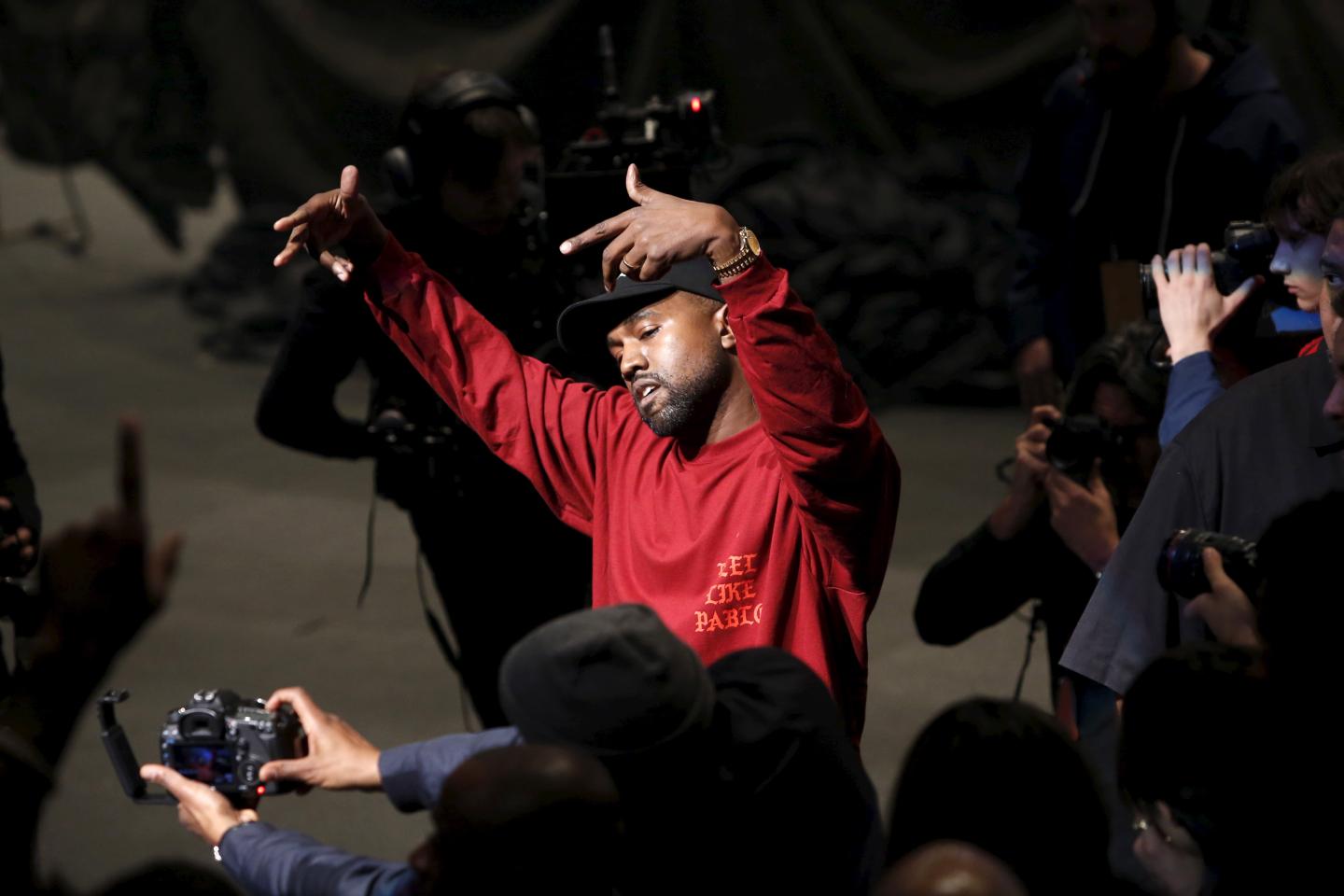 Kanye West dances during his Yeezy Season 3 Collection presentation and listening party during New York Fashion Week