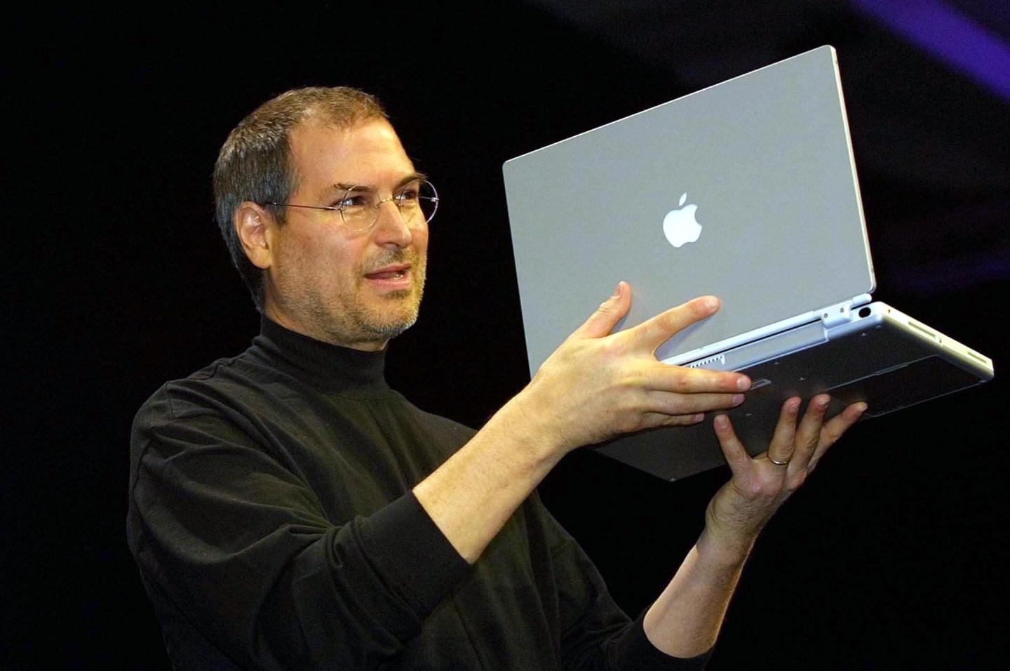 Steve Jobs, CEO of Apple Computer unveils a new ti