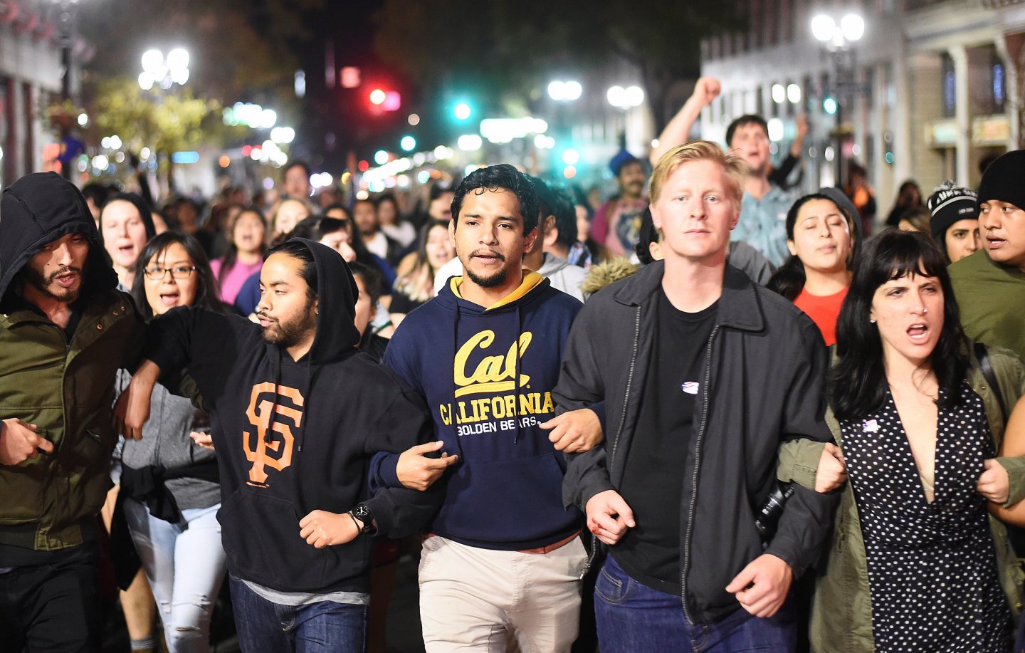 Protesters against president-elect Donald Trump march peacefully through Oakland, California, U.S., November 9, 2016.