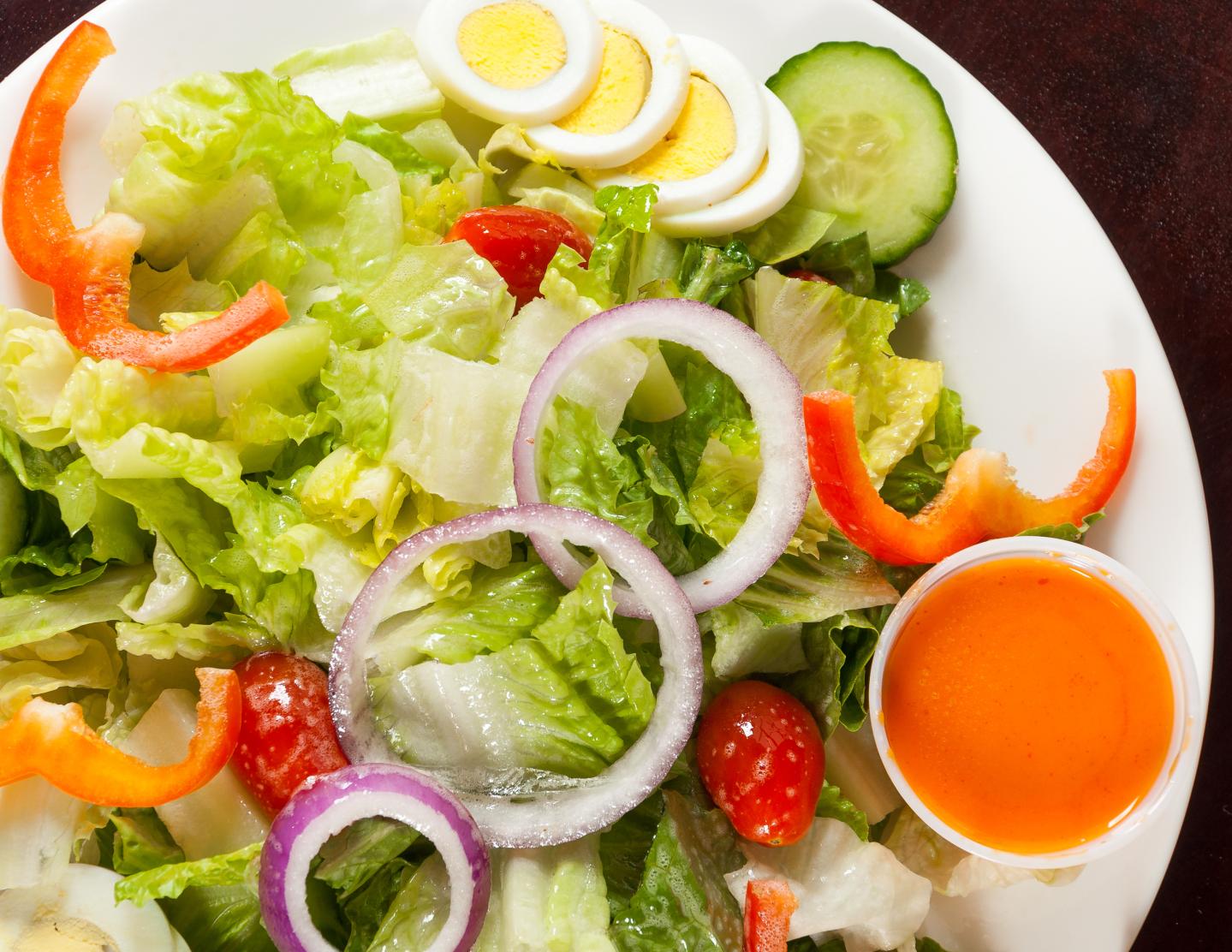 Close up on a nutritious fresh garden salad containing
