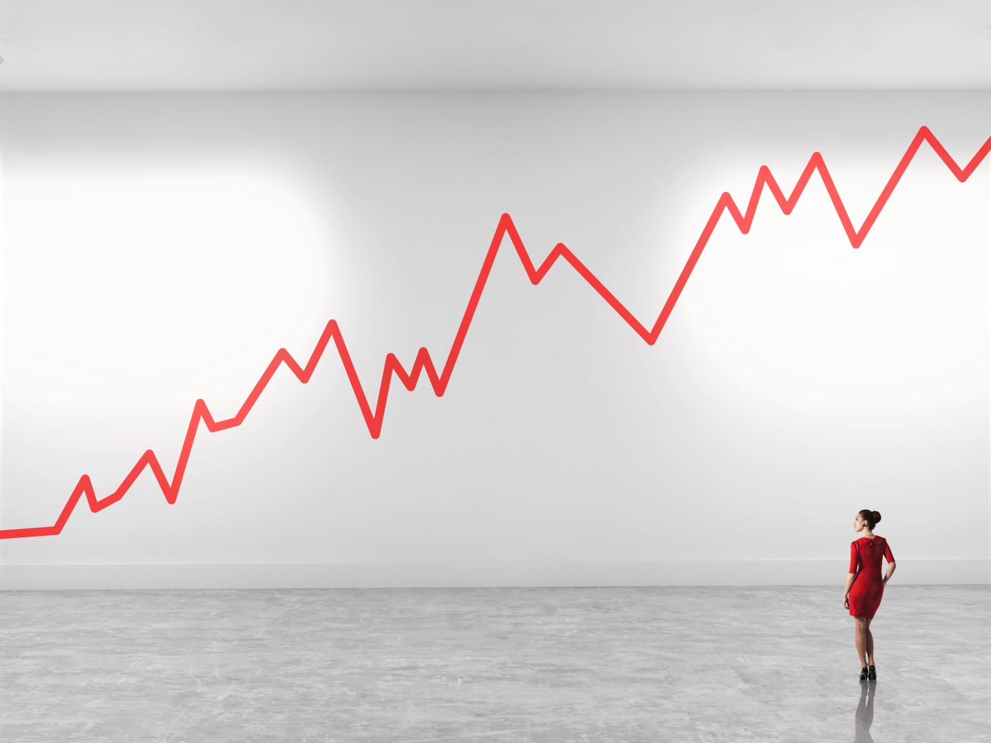 Woman looking up at zig zag line in gallery