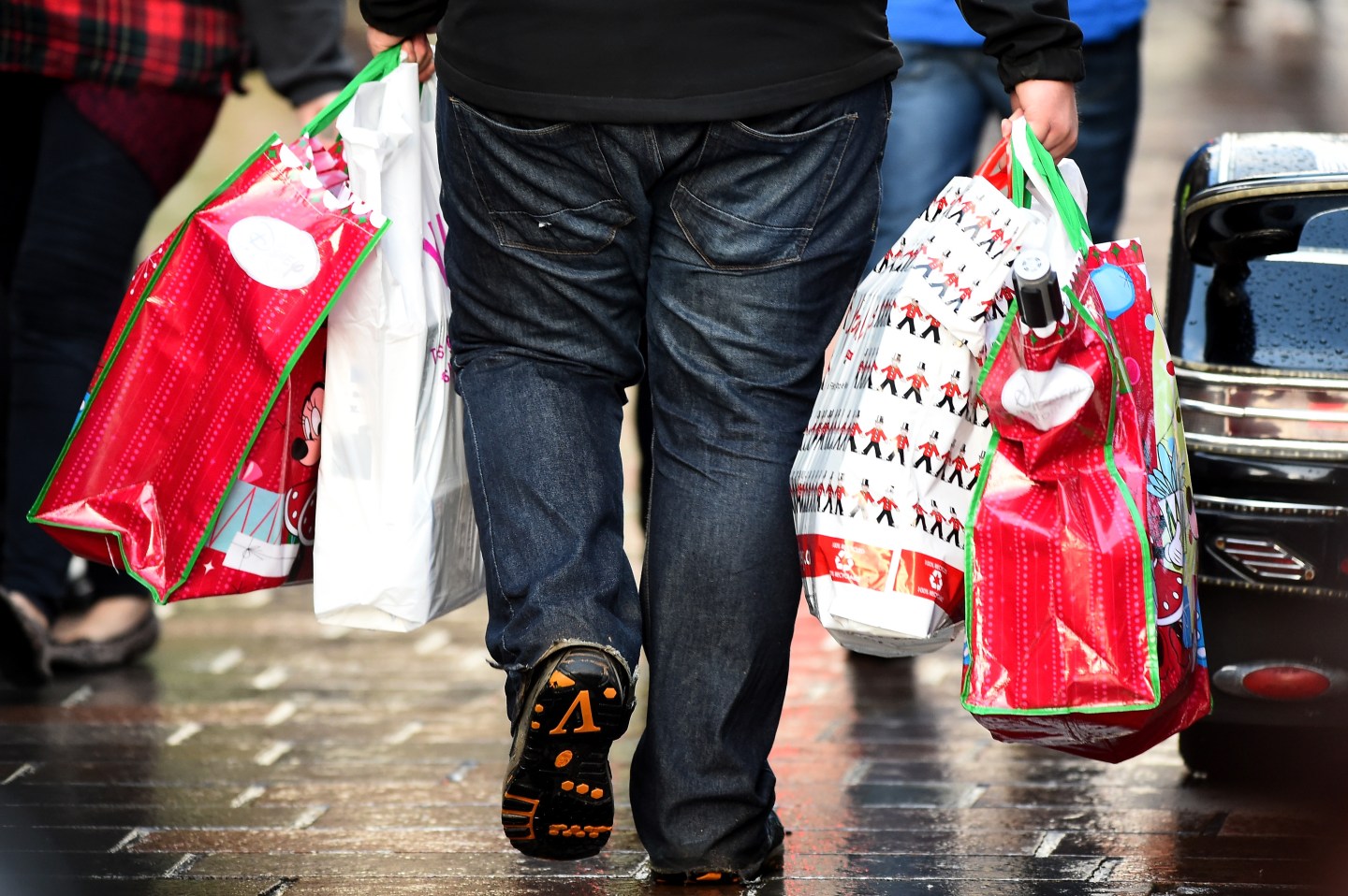 Christmas Shoppers Hit The High Streets Across the UK