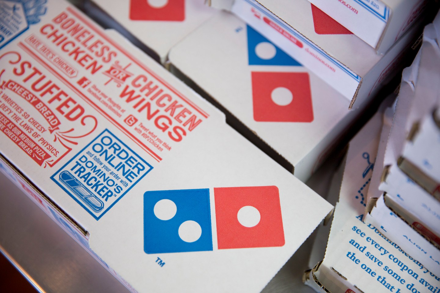 Boxes sit stacked at a Domino's Pizza Inc. restaurant.