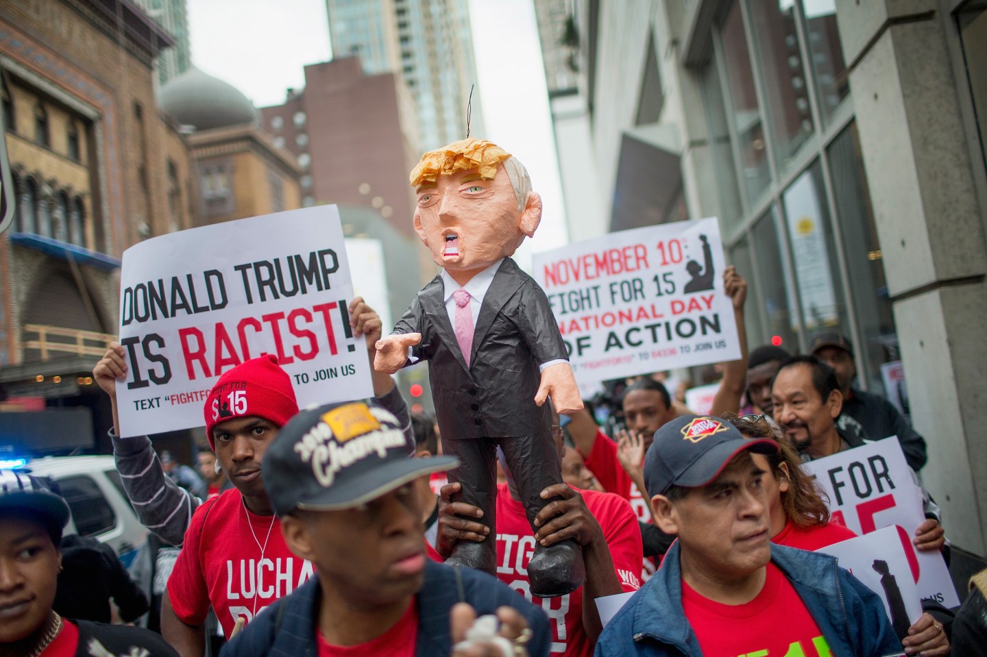Activists Protest For Immigration Reform And Fair Wages At Trump Tower In Chicago