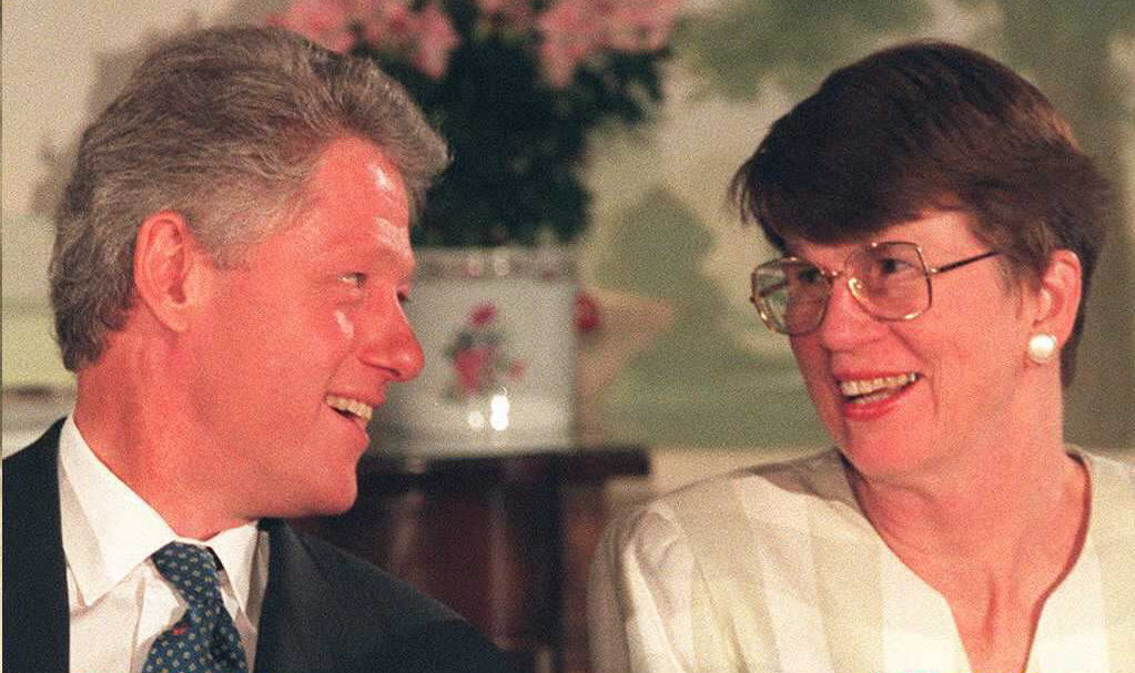 US President Bill Clinton(L) smiles at US Attorney