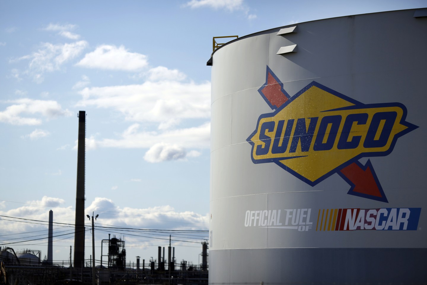 Signage is displayed on a former oil storage tank on the grounds of the Sunoco Logistics Marcus Hook Industrial Complex ethane terminal in Pennsylvania.