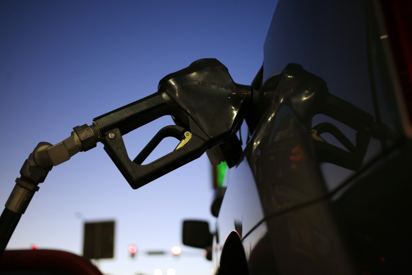 A fuel pump sits in the tank of a vehicle at a ConocoPhillips gas station in Texas.