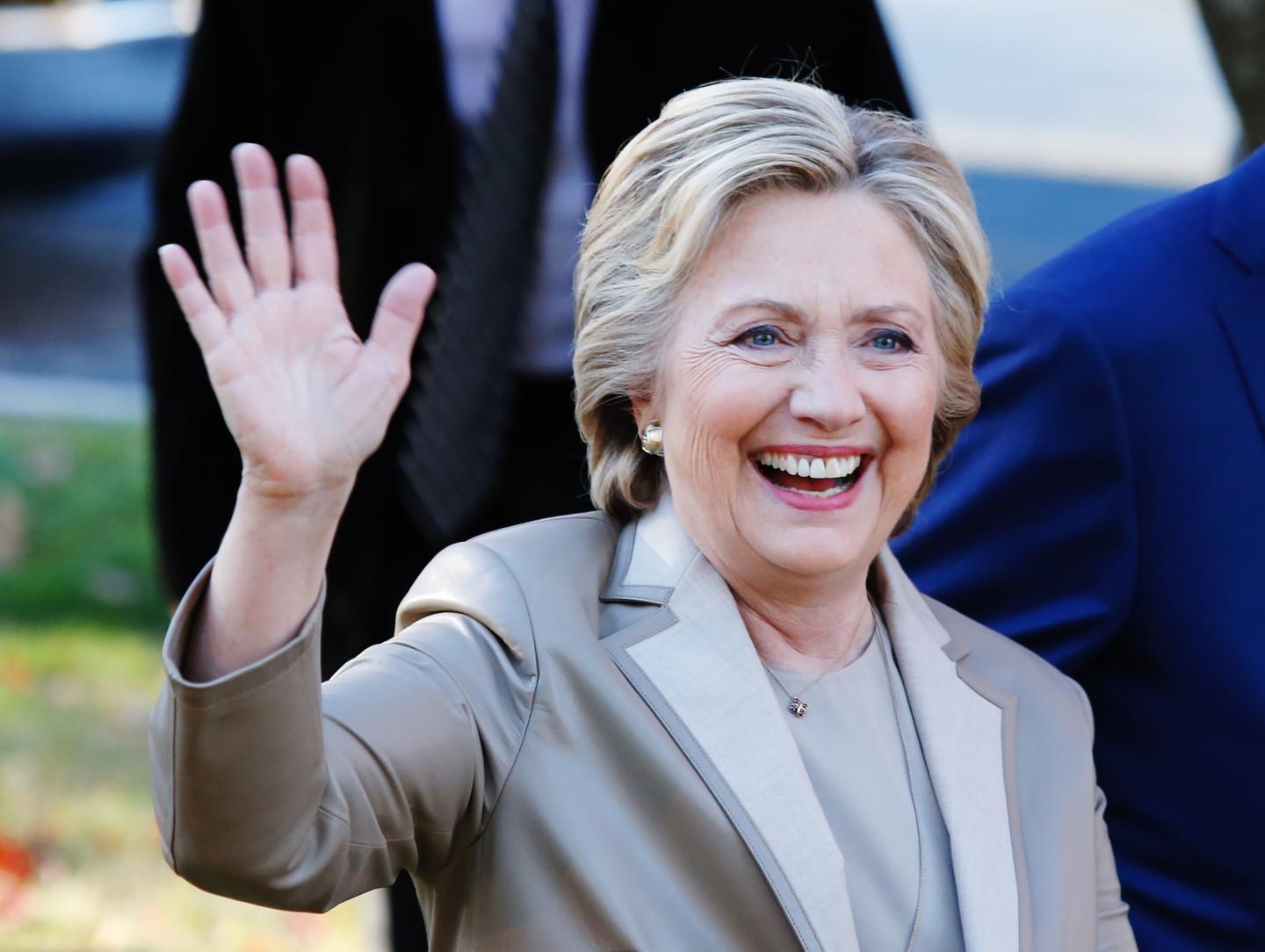 Democratic presidential nominee Hillary Clinton greets supporters after casting her vote in Chappaqua, New York on November 08, 2016.