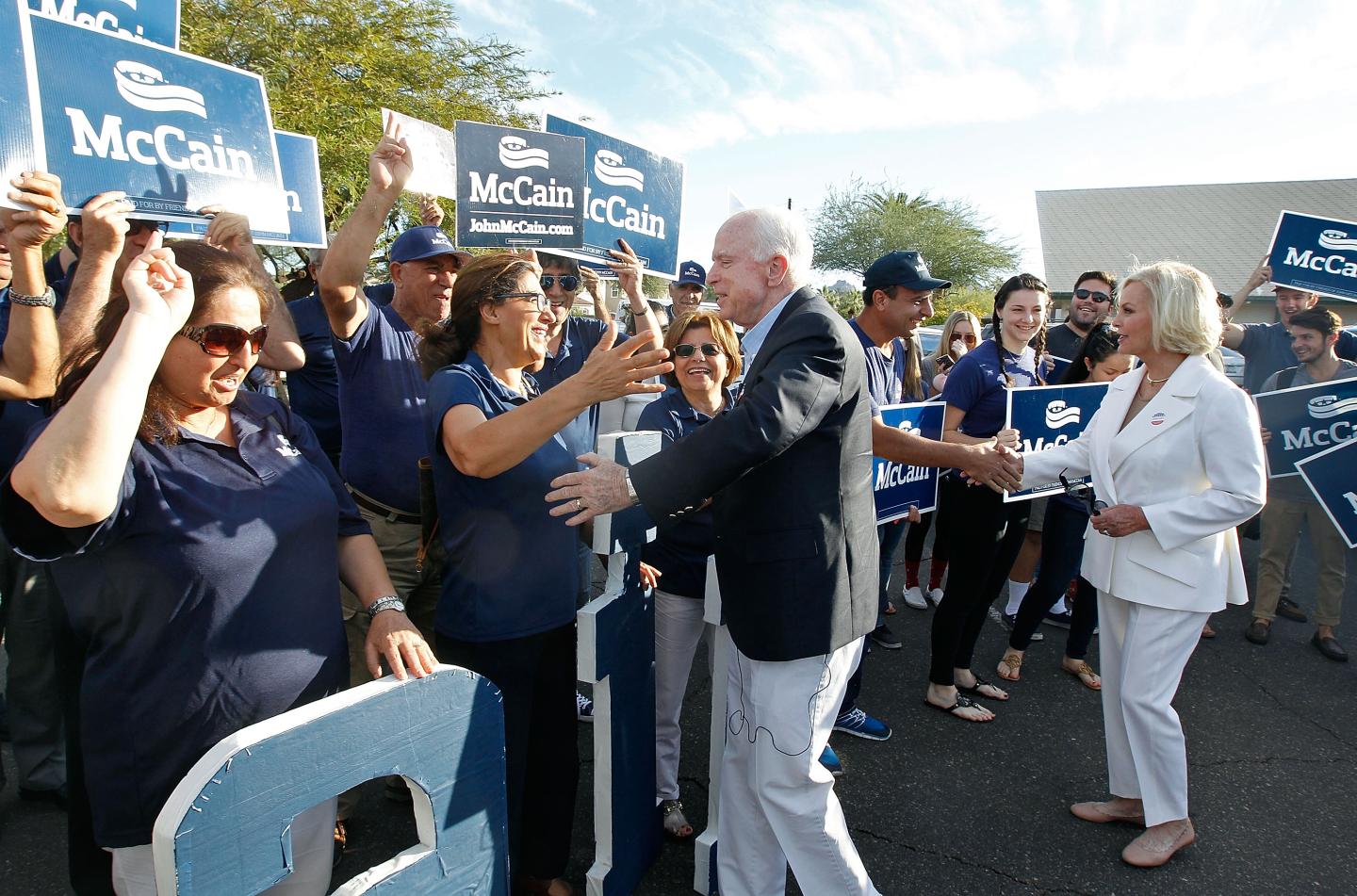 Sen. John McCain and his wife Cindy greet supporters on November 8, 2016 in Phoenix, Arizona.