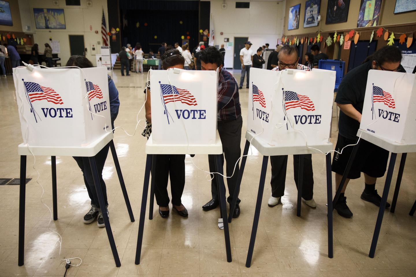 Voters Cast Their Ballots For The 2016 U.S. Presidential Election