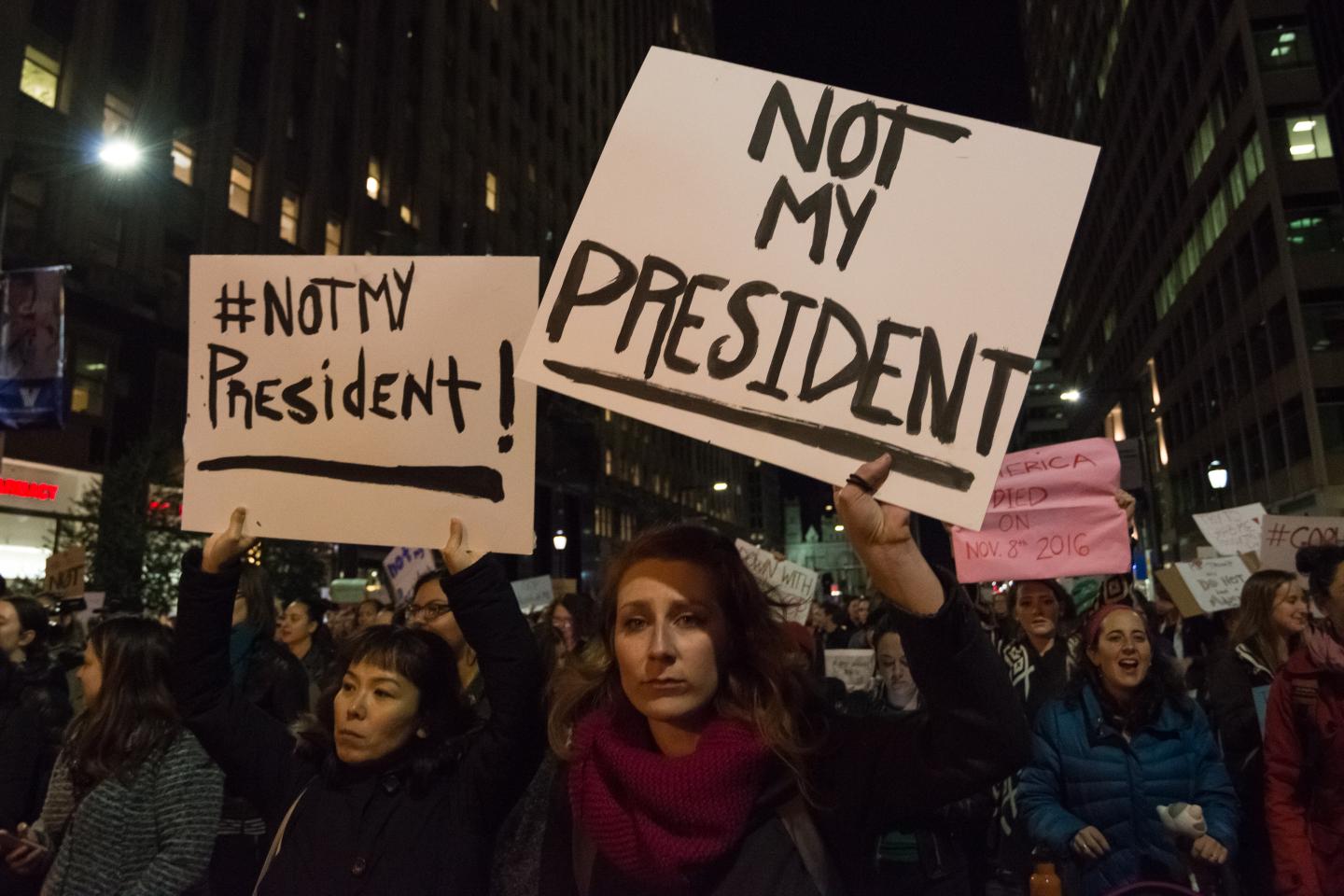 Demonstrators in downtown Philadelphia decry the political agenda of President-elect Donald J. Trump.