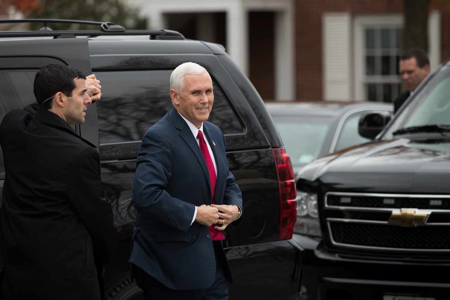 Vice President-elect Mike Pence arrives at the clubhouse at Trump International Golf Club in Bedminster Township, N.J.