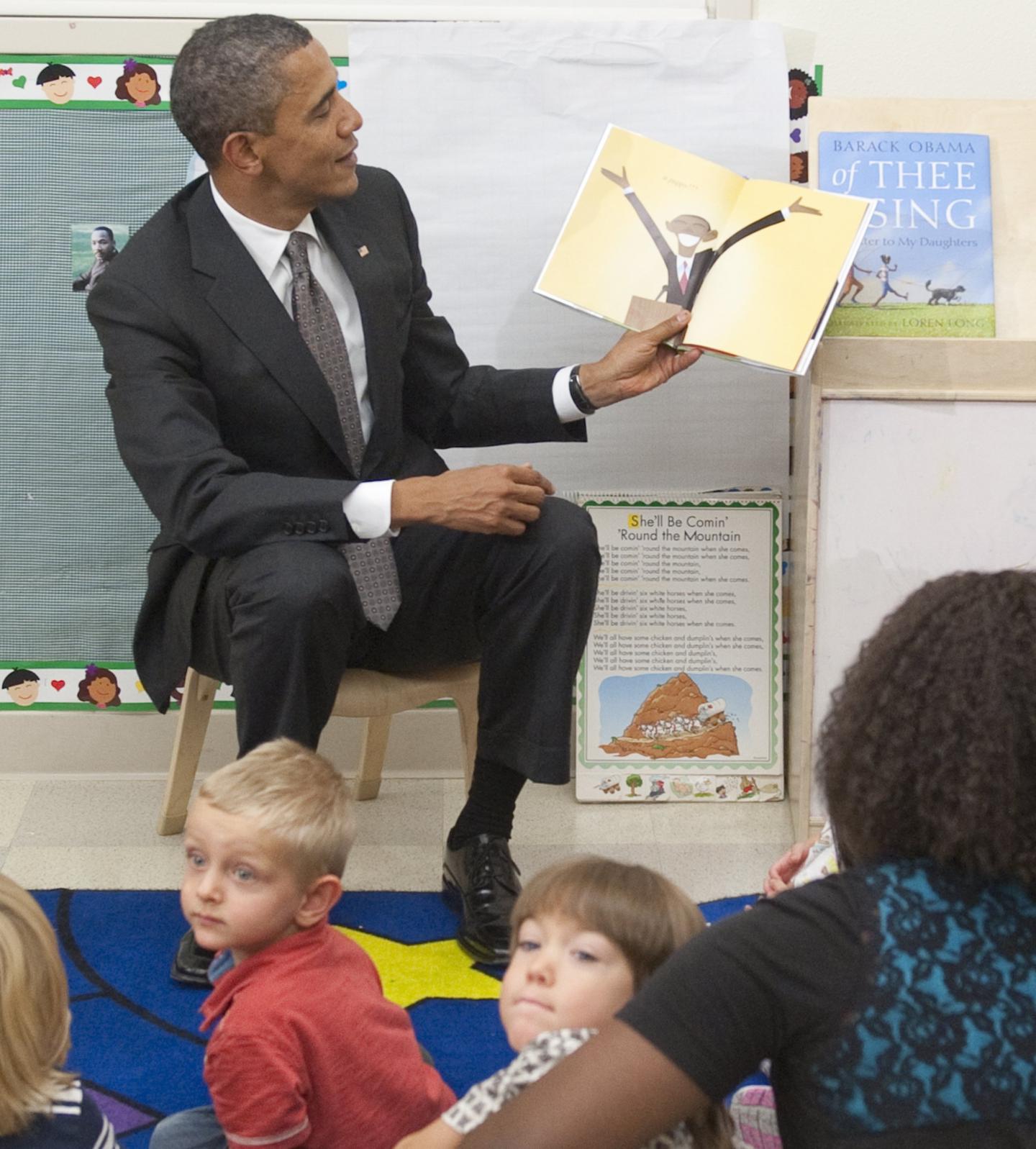 US President Barack Obama holds up a boo