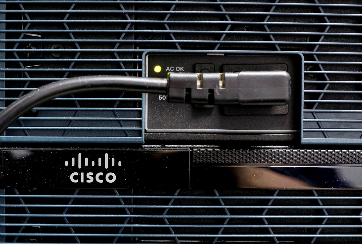 A Cisco logo is seen at the router in Kiev