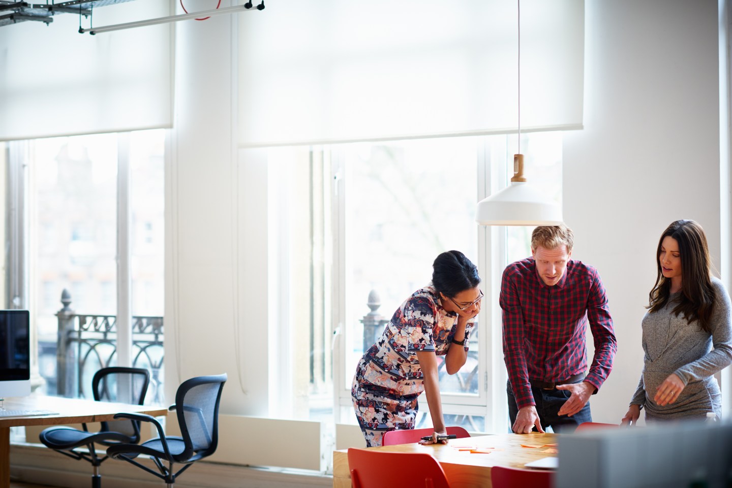 Colleagues discussing plans remember the office