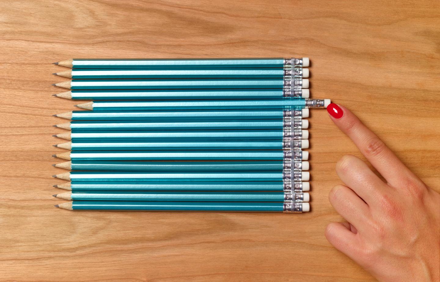 Teacher preparing pencils for school day
