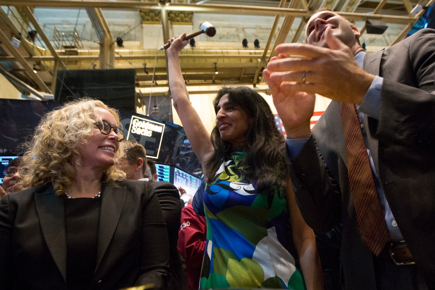 Ullal, president and CEO of Arista Networks, raises a gavel after her company's stock began trading during its IPO on the floor of the New York Stock Exchange