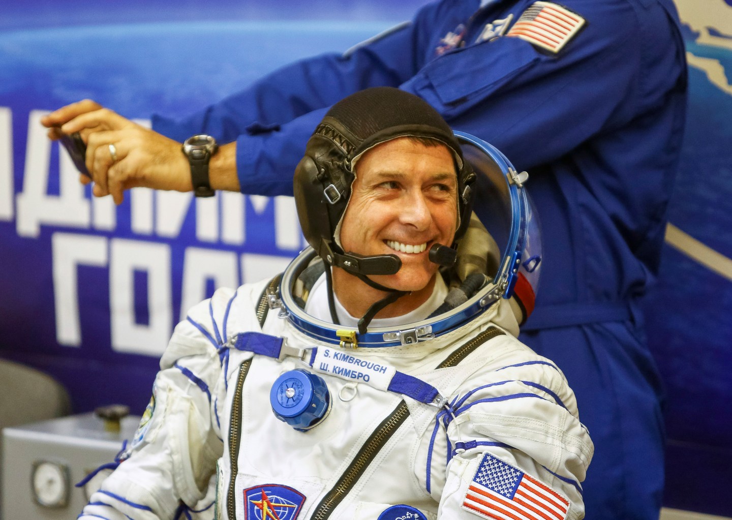 The International Space Station crew member Kimbrough of the U.S. smiles after donning a space suit at the Baikonur cosmodrome, Kazakhstan