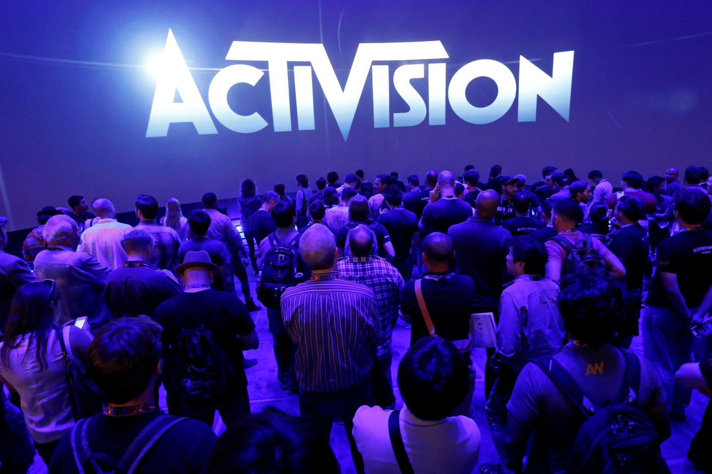 Crowd waits for video presentation at the Activision booth during the 2014 Electronic Entertainment Expo, known as E3, in Los Angeles
