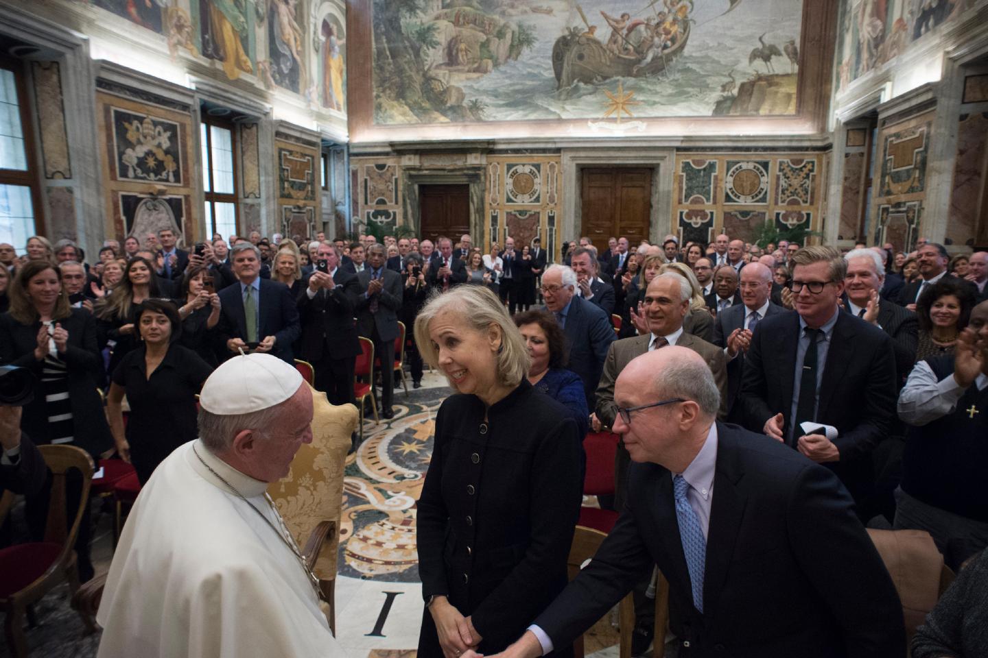 Pope Francis
greets Time
editor-inchief
Nancy
Gibbs and
Fortune’s
Alan Murray
in December.