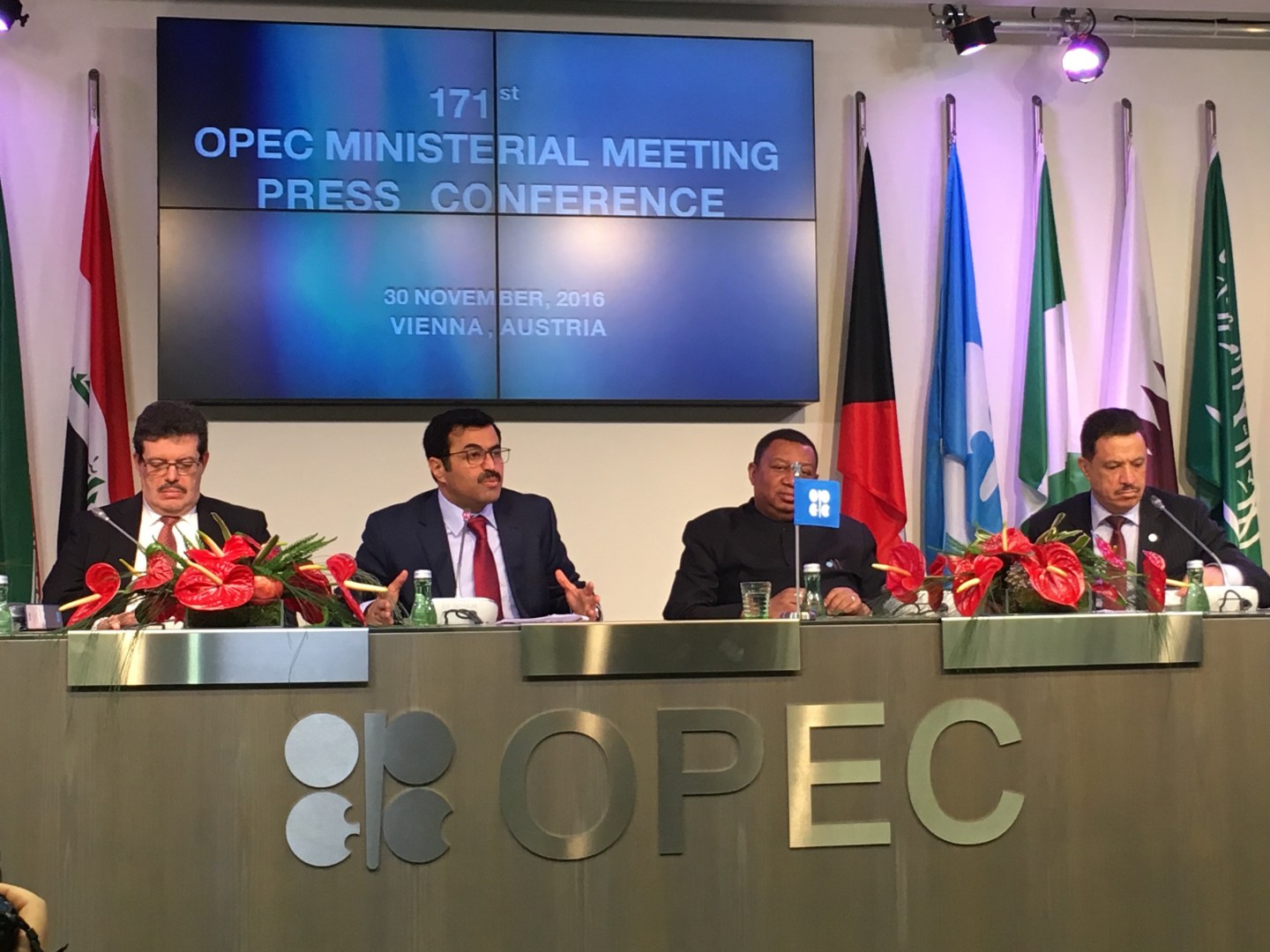 Qatar's Minister of Energy and the OPEC Conference President, Mohammed Bin Saleh Al-Sada (2nd L) and Secretary General of OPEC, Mohammad Sanusi Barkindo (2nd R) attend a press conference following the 171st Organization of Petroleum Exporting Countries (OPEC) meeting in Vienna.