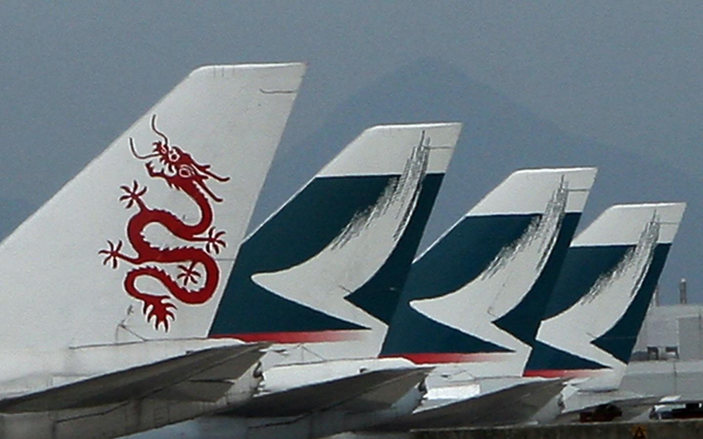 Dragon air (L) and Cathay Pacific planes