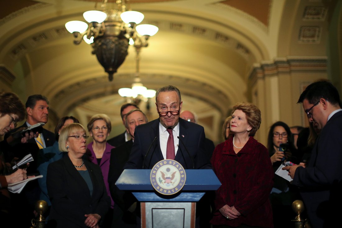 U.S. Senator Chuck Schumer (D-NY) talks to journalist after attending the Senate Democrat party leadership elections at the U.S. Capitol in Washington