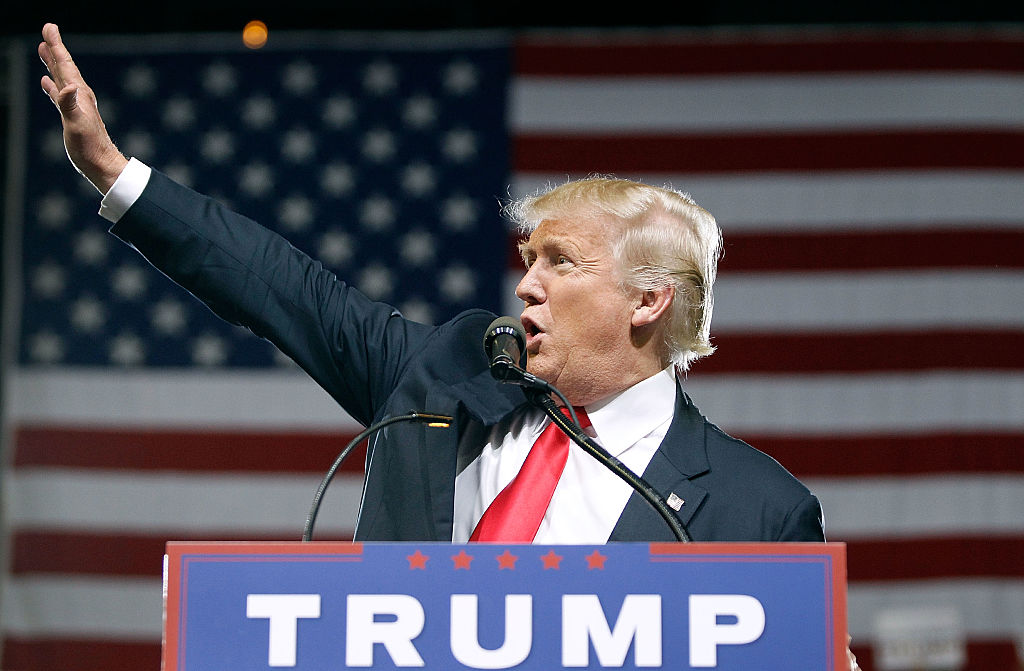 Donald Trump waves to supporters during a campaign rally on June 18, 2016 in Phoenix, Arizona.