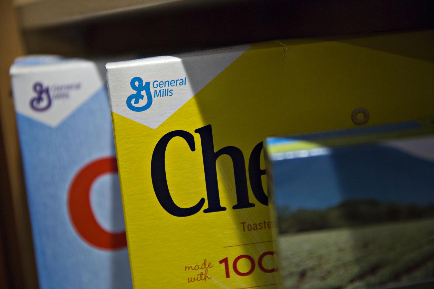 General Mills Inc. logos appear on boxes of Cheerios and Rice Chex brand cereal arranged for a photograph in Tiskilwa, Illinois, U.S., on Tuesday, Sept. 20, 2016.