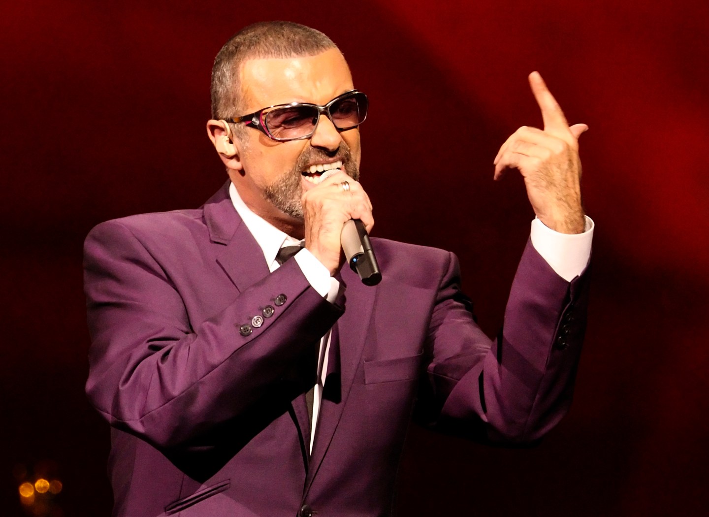 British singer George Michael performs on stage during his "Symphonica" tour concert in Vienna