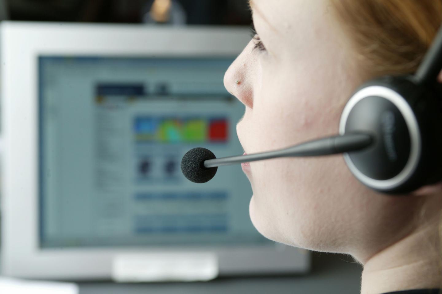 Woman with a headset / callcenter employee.