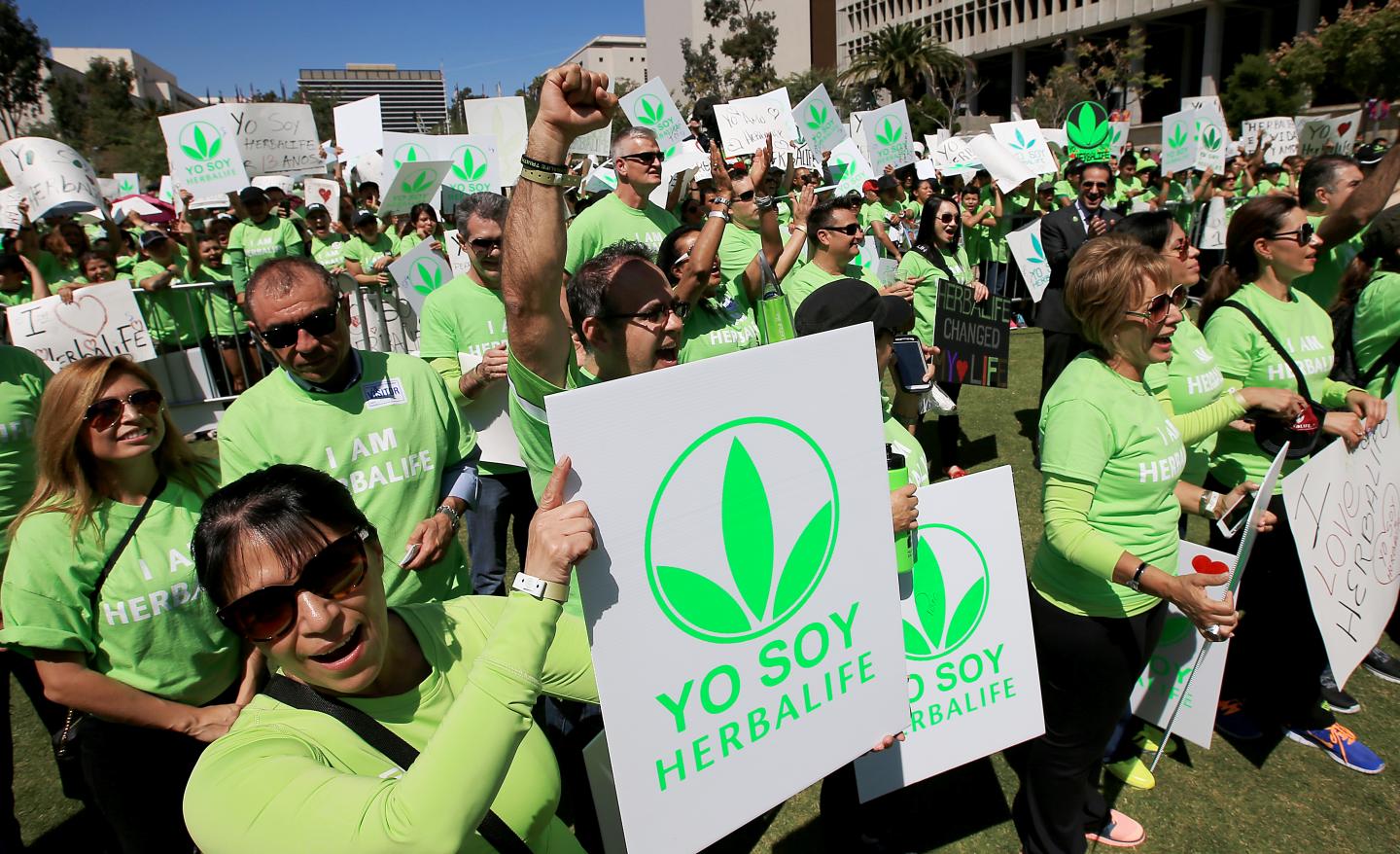 LOS ANGELES, CALIF. - MAR. 25, 2015.  About 4,000 Herbalife members dressed in green, waved signs an
