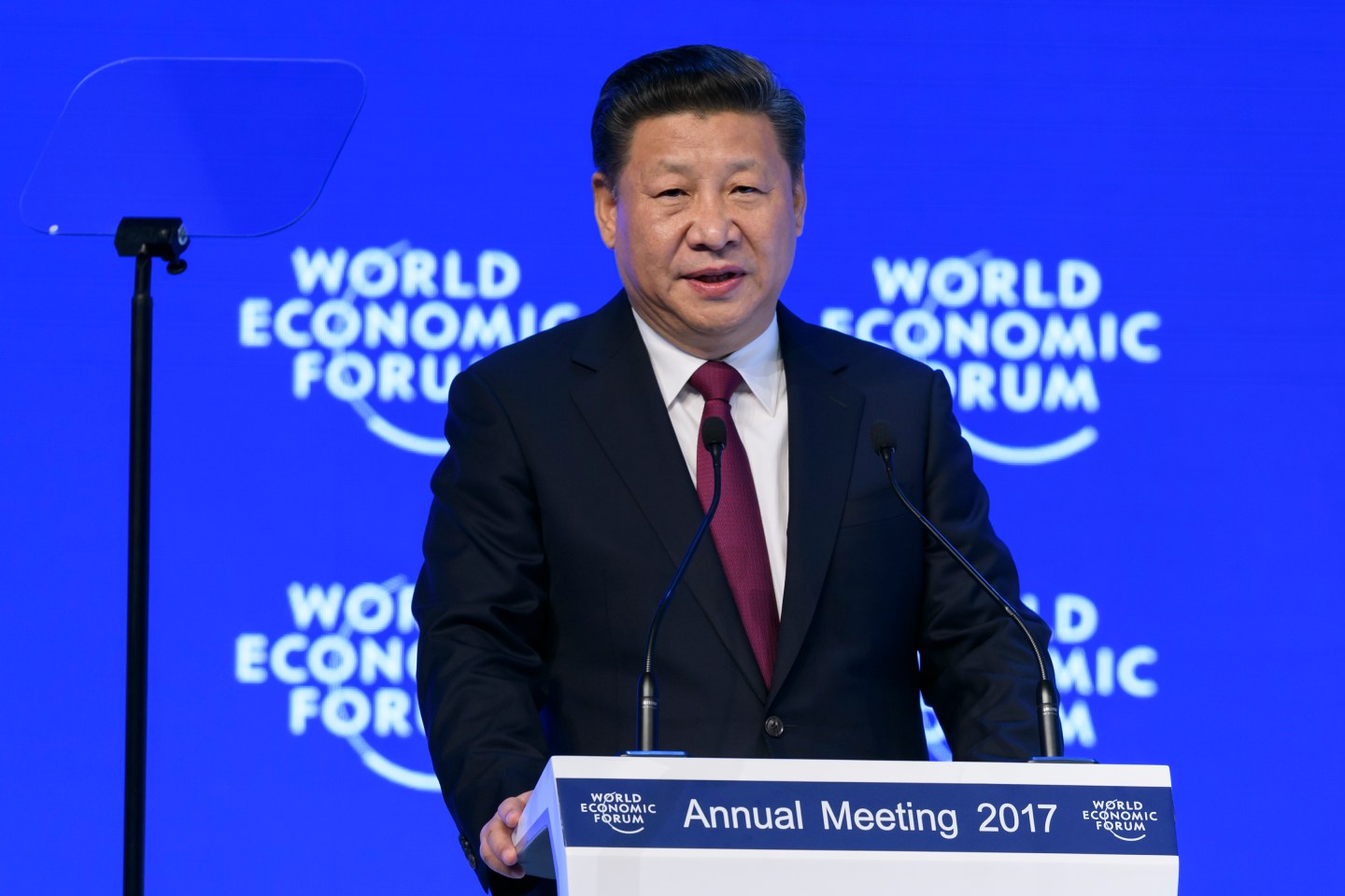 SWITZERLAND-ECONOMY-POLITICS-DIPLOMACY-SUMMITChina's President Xi Jinping delivers a speech during the first day of the World Economic Forum, on January 17, 2017 in Davos. Chinese President Xi Jinping said on January 17, 2017 that there is "no point" in blaming economic globalisation for the world's problems. The leader of the world's second largest economy made the comment at the World Economic Forum, where he is making his first appearance as China seeks to play a greater role in world trade regimes amid rising protectionism in the US and Europe. The global elite begin a week of earnest debate and Alpine partying in the Swiss ski resort of Davos, in a week bookended by two presidential speeches of historic import. / AFP / FABRICE COFFRINI (Photo credit should read FABRICE COFFRINI/AFP/Getty Images)