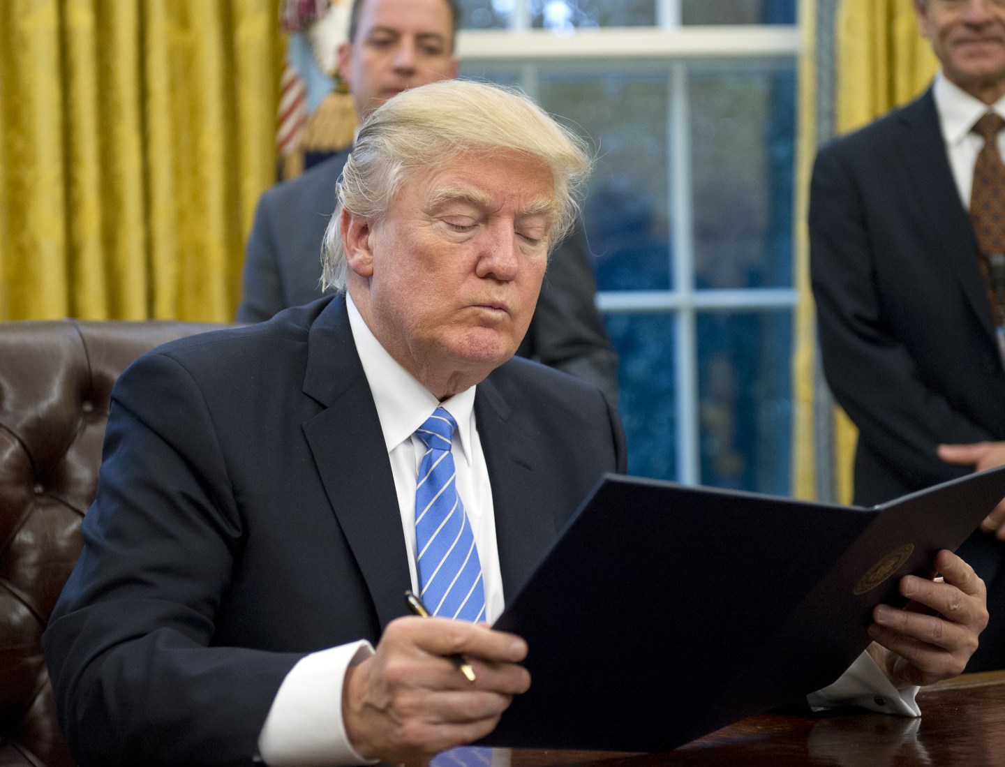 President Trump Signs Executive Orders In The Oval Office