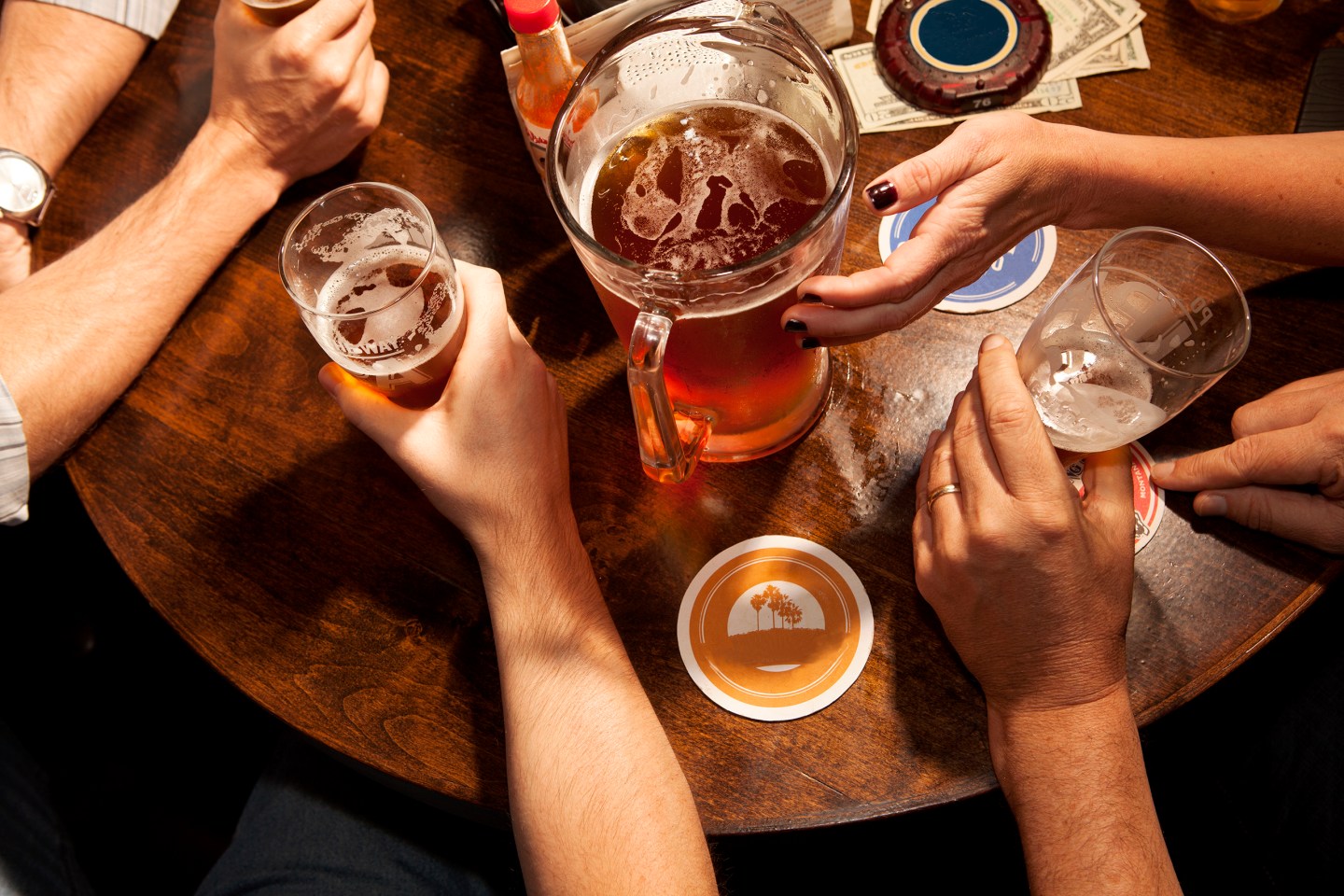 people drinking beer, shot from overhead