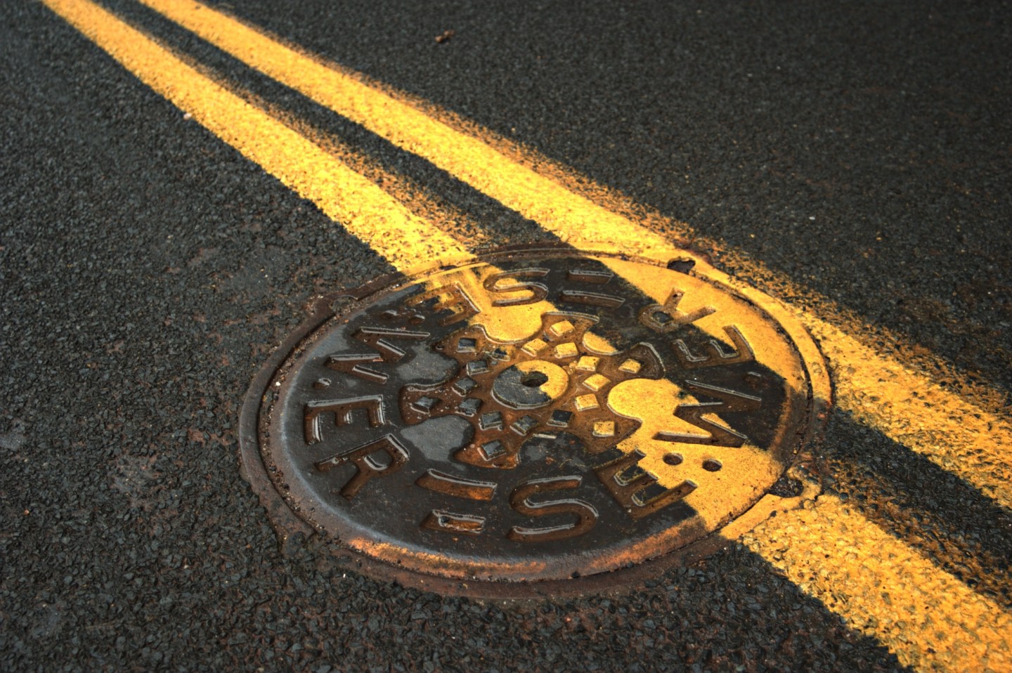 asphalt.stripe.sewer.manhole