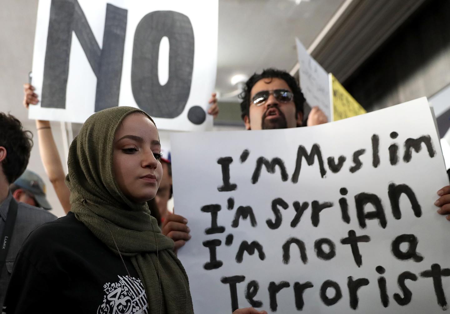 Protestors Rally Against Muslim Immigration Ban At LAX