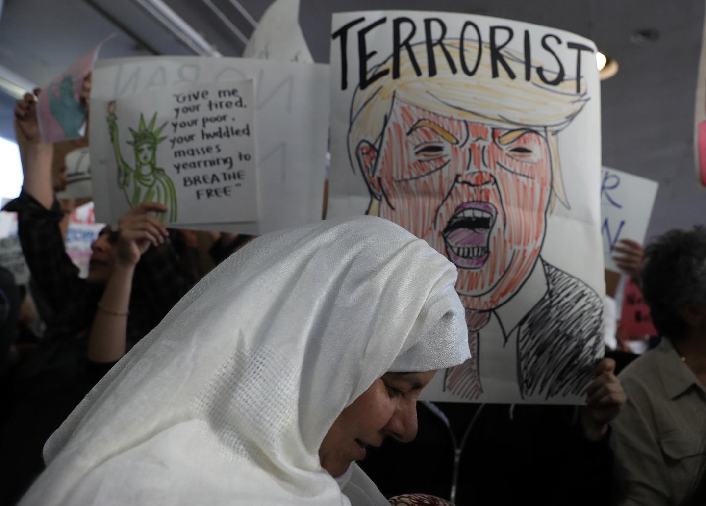 Protestors Rally Against Muslim Immigration Ban At LAX