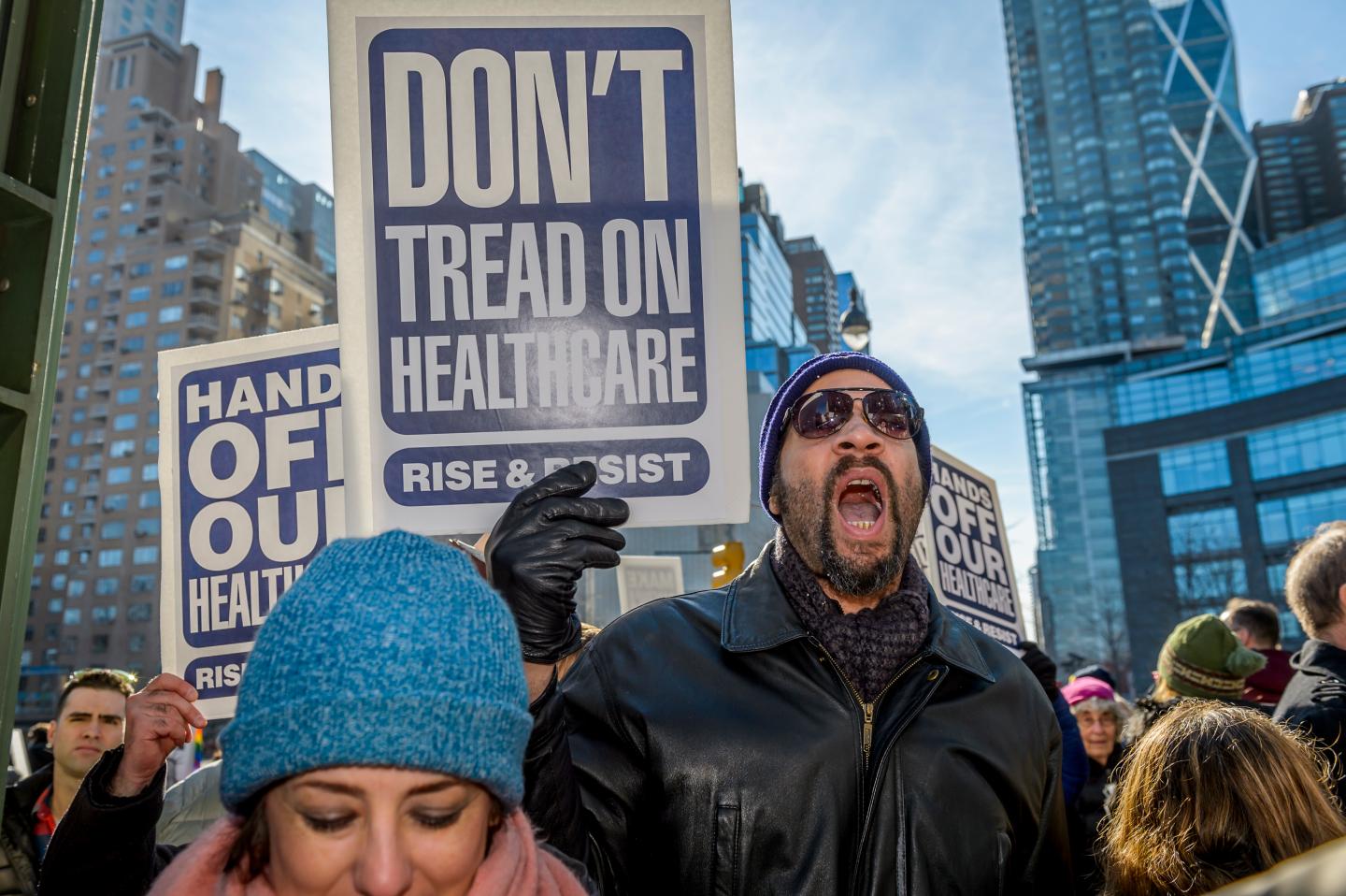 Hundreds of activists protest.