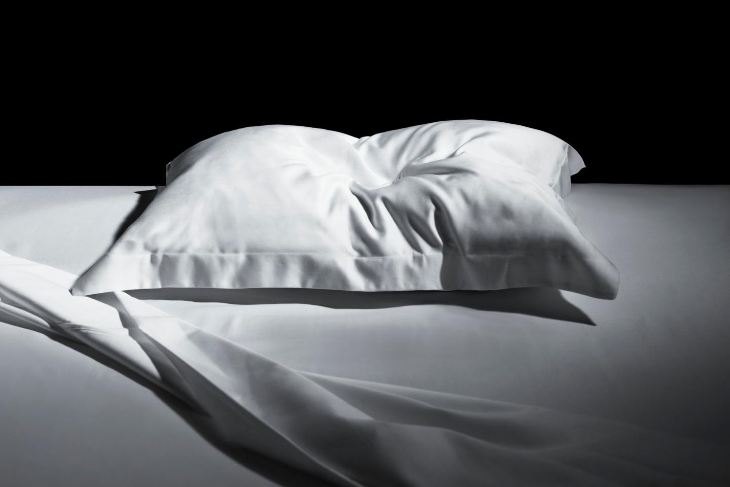 Pillow with head indentation