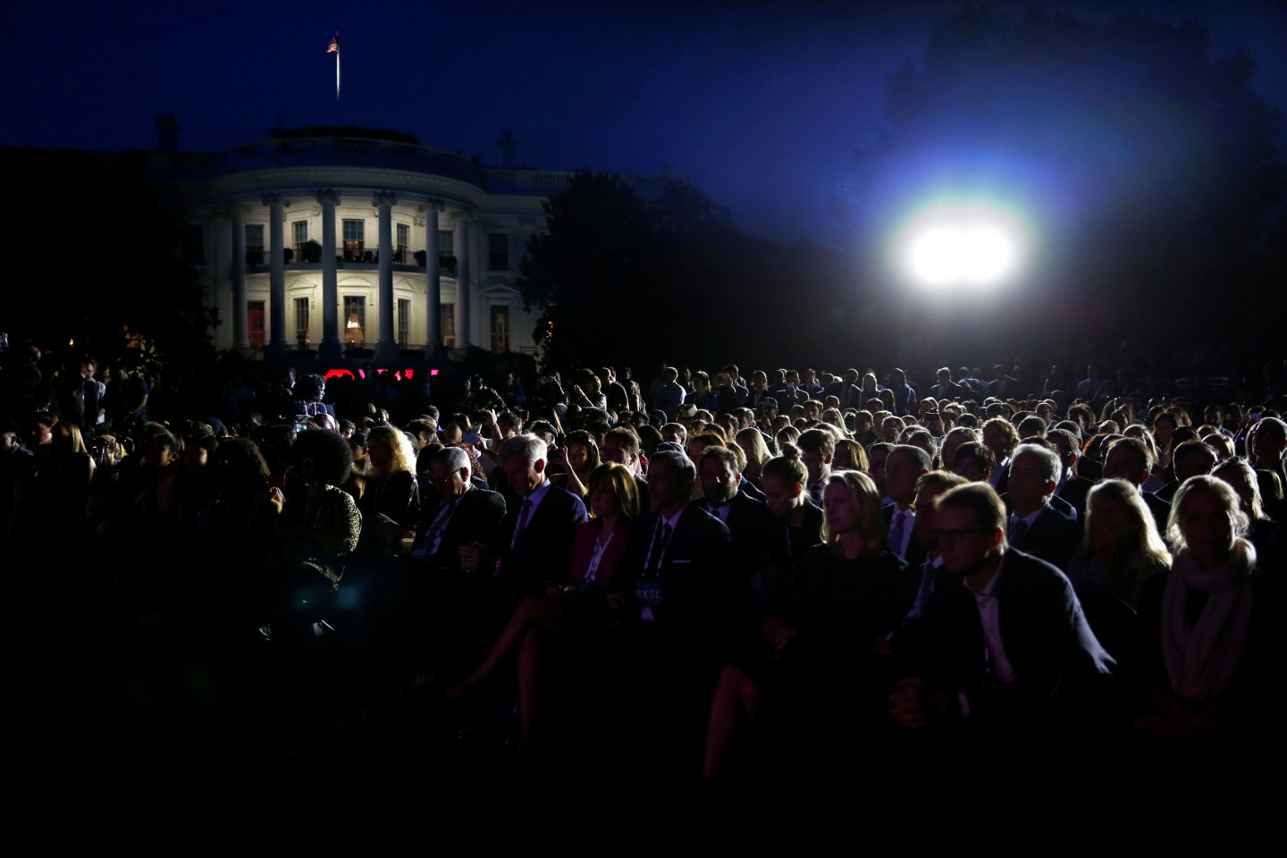 The audience listens to U.S. President Barack Obama during a discussion on the importance of protecting the one planet at the South by South Lawn event at the White House in Washington