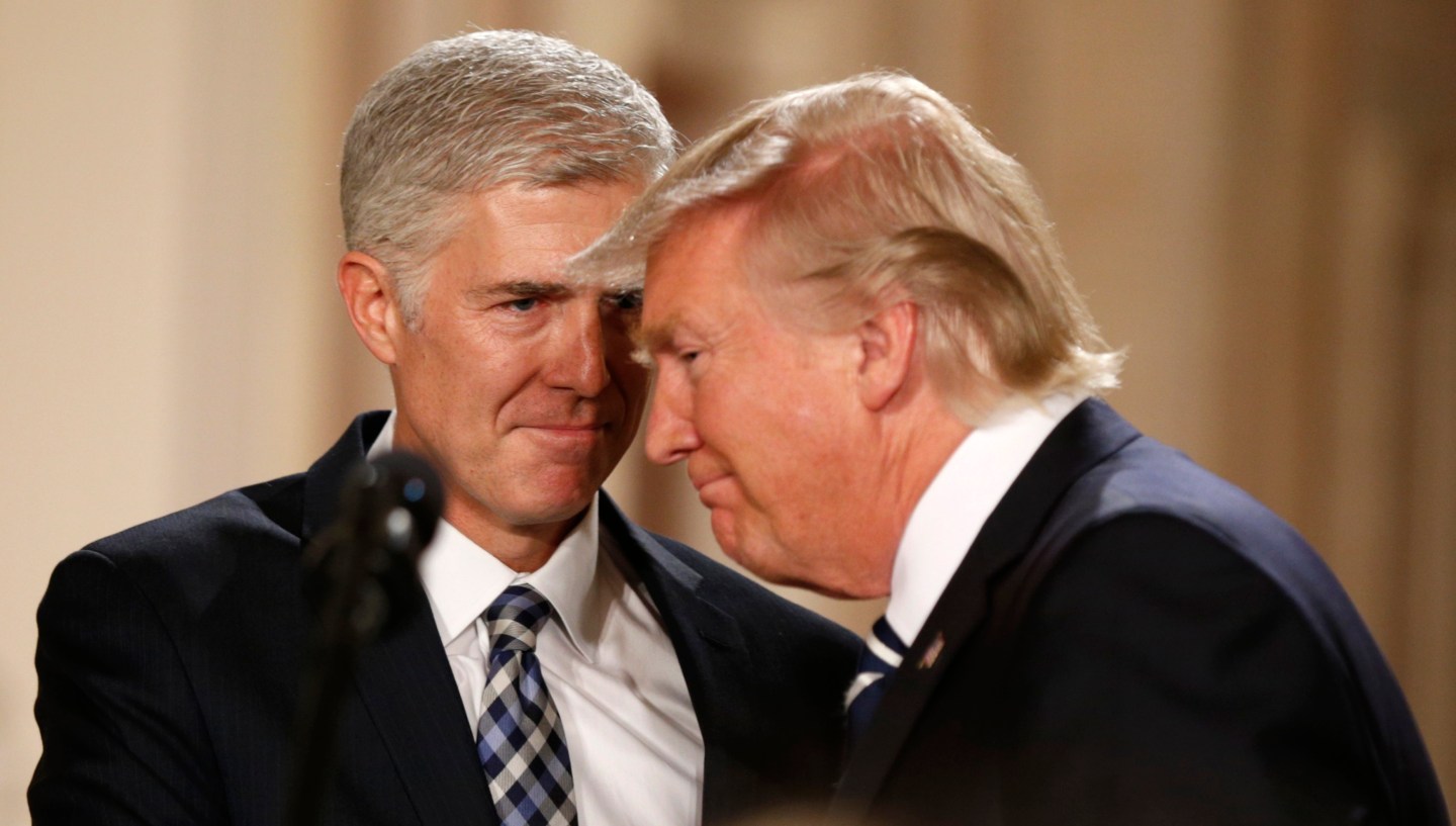 U.S. President Donald Trump and Neil Gorsuch smile as Trump nominated Gorsuch to be an associate justice of the U.S. Supreme Court at the White House in Washington