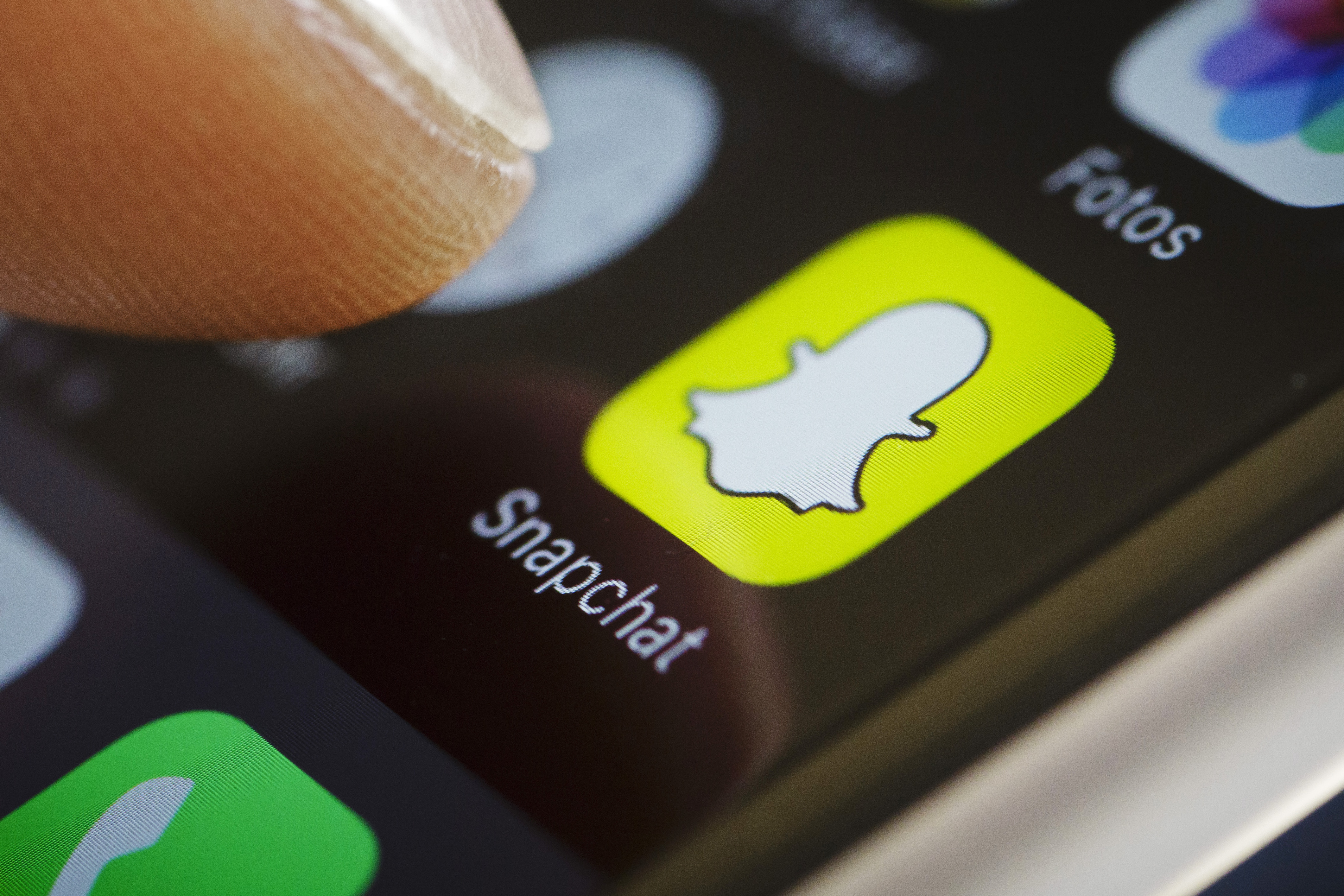 In this photo illustration the app of Snapchat is displayed on a smartphone on September 27, 2016 in Berlin, Germany.