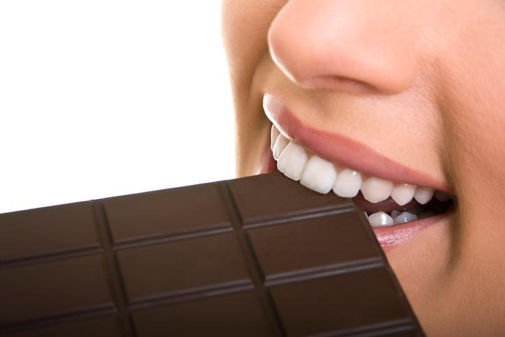 woman eat chocolate
