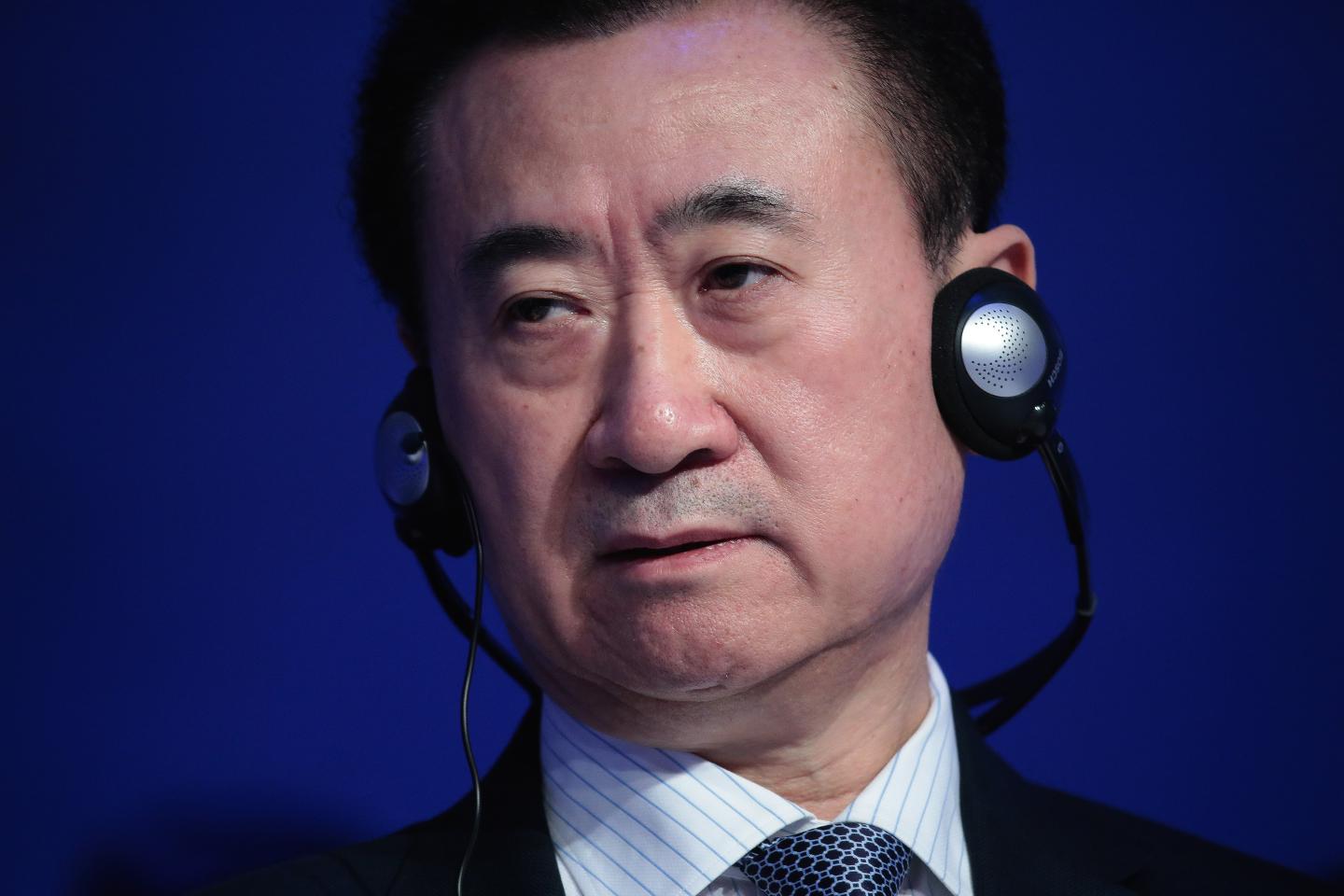 Day Two Of The World Economic Forum (WEF) 2017Wang Jianlin, billionaire and chairman and president of Dalian Wanda Group Co., listens during a panel session at the World Economic Forum (WEF) in Davos, Switzerland, on Wednesday, Jan. 18, 2017. World leaders, influential executives, bankers and policy makers attend the 47th annual meeting of the World Economic Forum in Davos from Jan. 17 - 20. Photographer: Jason Alden/Bloomberg via Getty Images